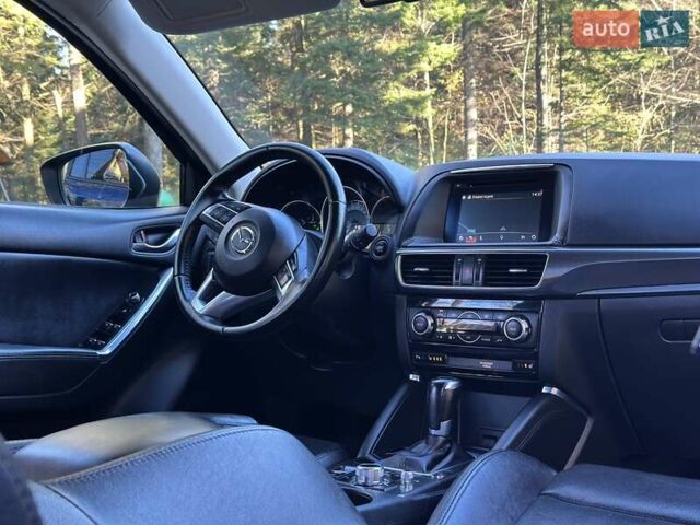 Синий Мазда СХ-5, объемом двигателя 2.19 л и пробегом 171 тыс. км за 16777 $, фото 53 на Automoto.ua