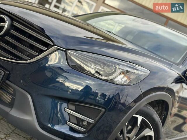 Синий Мазда СХ-5, объемом двигателя 2.19 л и пробегом 171 тыс. км за 16777 $, фото 22 на Automoto.ua