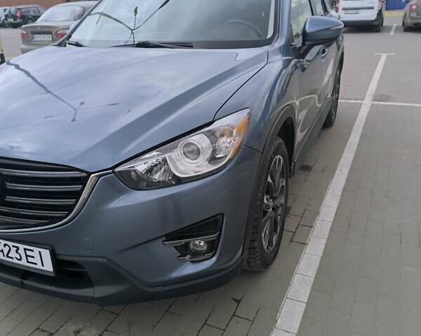 Синий Мазда СХ-5, объемом двигателя 2.49 л и пробегом 145 тыс. км за 16300 $, фото 1 на Automoto.ua
