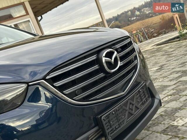 Синий Мазда СХ-5, объемом двигателя 2.19 л и пробегом 171 тыс. км за 16777 $, фото 29 на Automoto.ua