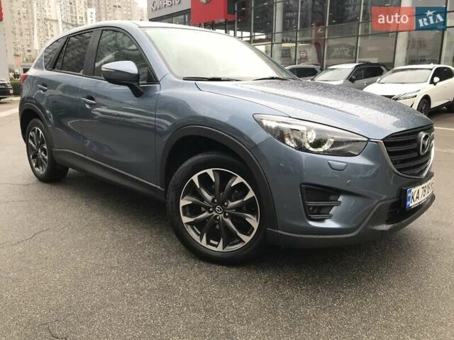 Синий Мазда СХ-5, объемом двигателя 2.49 л и пробегом 124 тыс. км за 16900 $, фото 1 на Automoto.ua