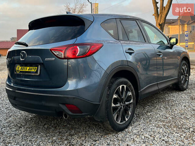 Синий Мазда СХ-5, объемом двигателя 2.49 л и пробегом 170 тыс. км за 16500 $, фото 6 на Automoto.ua