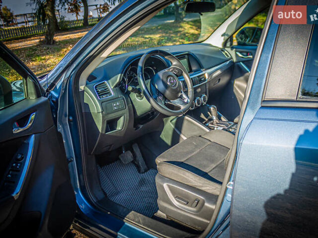 Синий Мазда СХ-5, объемом двигателя 2.5 л и пробегом 80 тыс. км за 16400 $, фото 6 на Automoto.ua