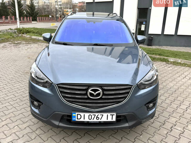 Синий Мазда СХ-5, объемом двигателя 2.49 л и пробегом 136 тыс. км за 13900 $, фото 4 на Automoto.ua