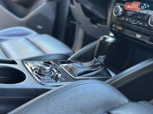 Синий Мазда СХ-5, объемом двигателя 2.19 л и пробегом 171 тыс. км за 16777 $, фото 66 на Automoto.ua