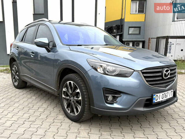 Синий Мазда СХ-5, объемом двигателя 2.49 л и пробегом 136 тыс. км за 13900 $, фото 2 на Automoto.ua