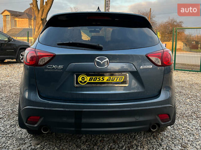 Синий Мазда СХ-5, объемом двигателя 2.49 л и пробегом 170 тыс. км за 16500 $, фото 5 на Automoto.ua