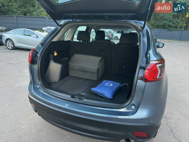 Синий Мазда СХ-5, объемом двигателя 2.49 л и пробегом 255 тыс. км за 13300 $, фото 16 на Automoto.ua