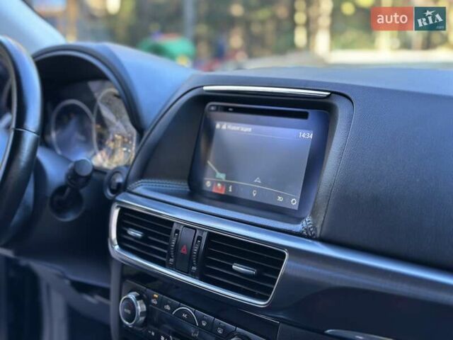 Синий Мазда СХ-5, объемом двигателя 2.19 л и пробегом 171 тыс. км за 16777 $, фото 64 на Automoto.ua