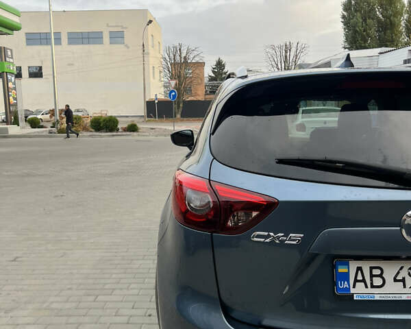 Синий Мазда СХ-5, объемом двигателя 2.49 л и пробегом 129 тыс. км за 14200 $, фото 2 на Automoto.ua