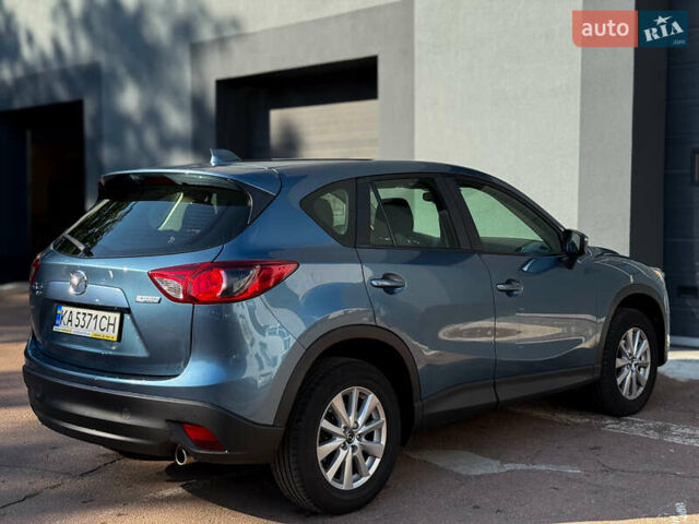 Синий Мазда СХ-5, объемом двигателя 2.49 л и пробегом 255 тыс. км за 13300 $, фото 5 на Automoto.ua