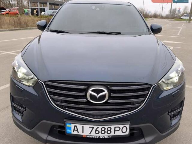 Синий Мазда СХ-5, объемом двигателя 2.5 л и пробегом 129 тыс. км за 16900 $, фото 2 на Automoto.ua