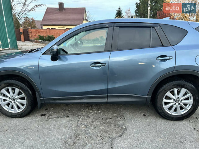 Синий Мазда СХ-5, объемом двигателя 2.49 л и пробегом 122 тыс. км за 15500 $, фото 1 на Automoto.ua