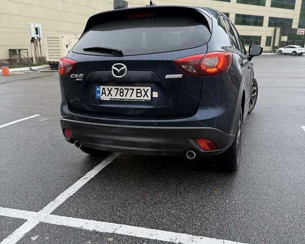 Синий Мазда СХ-5, объемом двигателя 2.19 л и пробегом 160 тыс. км за 15500 $, фото 4 на Automoto.ua