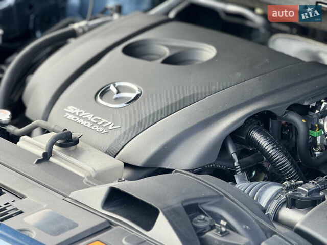 Синий Мазда СХ-5, объемом двигателя 2.5 л и пробегом 61 тыс. км за 18900 $, фото 60 на Automoto.ua