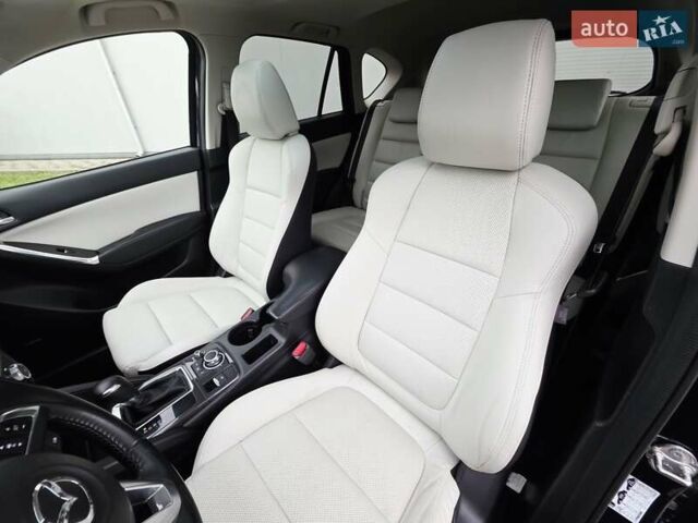 Синий Мазда СХ-5, объемом двигателя 2.2 л и пробегом 148 тыс. км за 18450 $, фото 98 на Automoto.ua