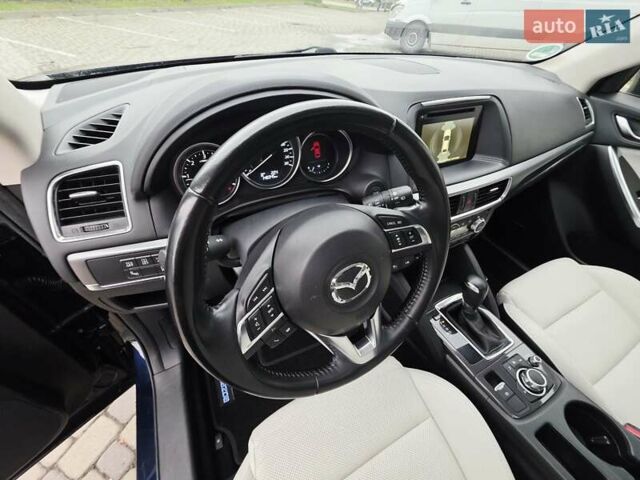 Синий Мазда СХ-5, объемом двигателя 2.2 л и пробегом 148 тыс. км за 18450 $, фото 91 на Automoto.ua