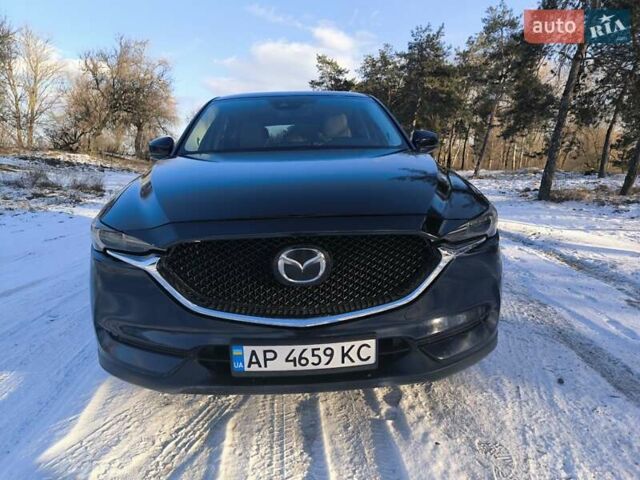 Синий Мазда СХ-5, объемом двигателя 2.5 л и пробегом 126 тыс. км за 18300 $, фото 1 на Automoto.ua