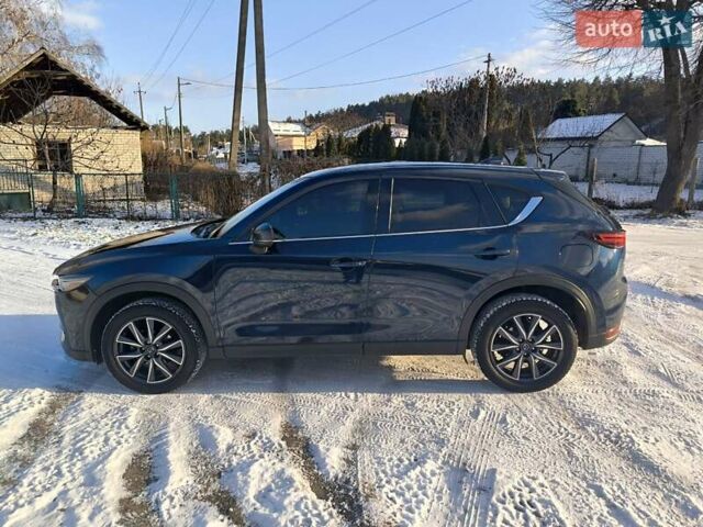 Синий Мазда СХ-5, объемом двигателя 2.5 л и пробегом 126 тыс. км за 18300 $, фото 4 на Automoto.ua