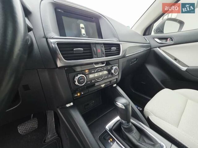 Синий Мазда СХ-5, объемом двигателя 2.2 л и пробегом 148 тыс. км за 18450 $, фото 94 на Automoto.ua