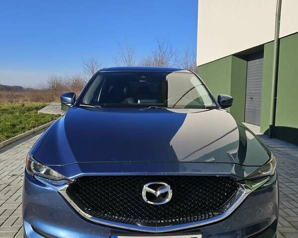 Синий Мазда СХ-5, объемом двигателя 2.49 л и пробегом 93 тыс. км за 18400 $, фото 5 на Automoto.ua