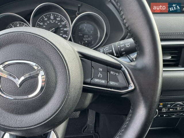 Синий Мазда СХ-5, объемом двигателя 2.5 л и пробегом 61 тыс. км за 18900 $, фото 31 на Automoto.ua