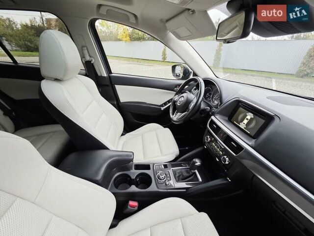 Синий Мазда СХ-5, объемом двигателя 2.2 л и пробегом 148 тыс. км за 18450 $, фото 58 на Automoto.ua