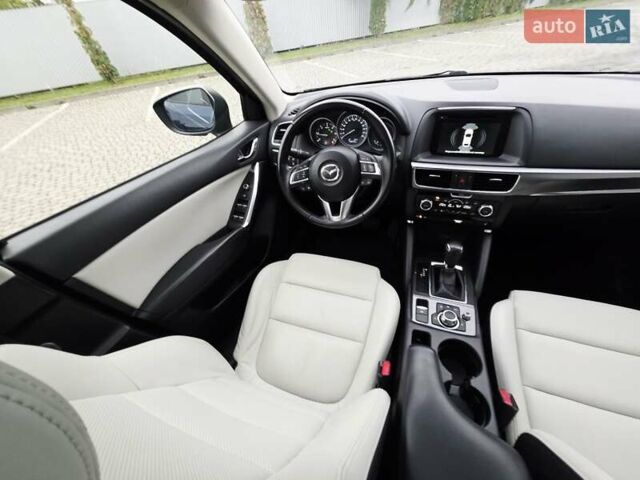 Синий Мазда СХ-5, объемом двигателя 2.2 л и пробегом 148 тыс. км за 18450 $, фото 82 на Automoto.ua