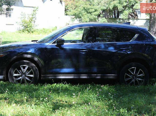 Синий Мазда СХ-5, объемом двигателя 2.49 л и пробегом 107 тыс. км за 17800 $, фото 4 на Automoto.ua