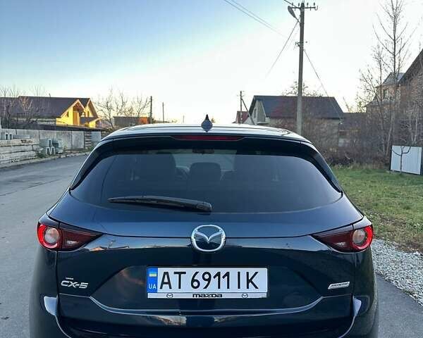 Синий Мазда СХ-5, объемом двигателя 2.5 л и пробегом 140 тыс. км за 18500 $, фото 4 на Automoto.ua