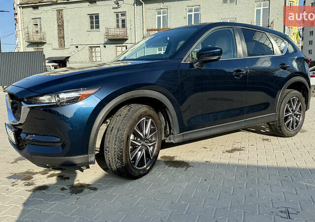 Синий Мазда СХ-5, объемом двигателя 2.49 л и пробегом 123 тыс. км за 16900 $, фото 1 на Automoto.ua