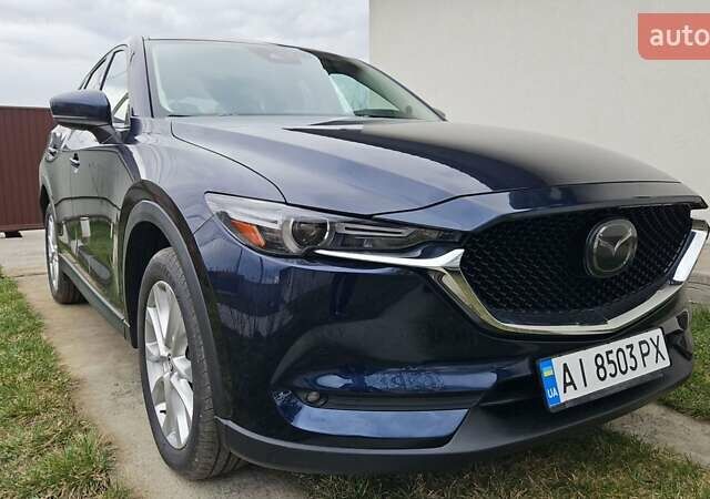 Синий Мазда СХ-5, объемом двигателя 2.49 л и пробегом 195 тыс. км за 23000 $, фото 7 на Automoto.ua