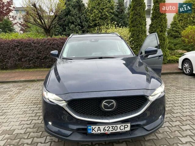 Синий Мазда СХ-5, объемом двигателя 2.49 л и пробегом 102 тыс. км за 18600 $, фото 2 на Automoto.ua