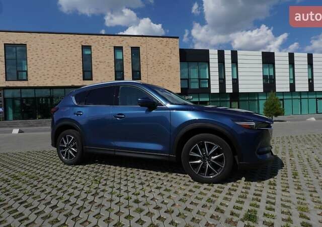 Синий Мазда СХ-5, объемом двигателя 2.49 л и пробегом 109 тыс. км за 22000 $, фото 1 на Automoto.ua