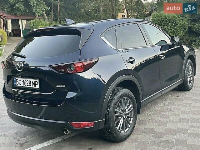 Синий Мазда СХ-5, объемом двигателя 2.49 л и пробегом 148 тыс. км за 18400 $, фото 2 на Automoto.ua