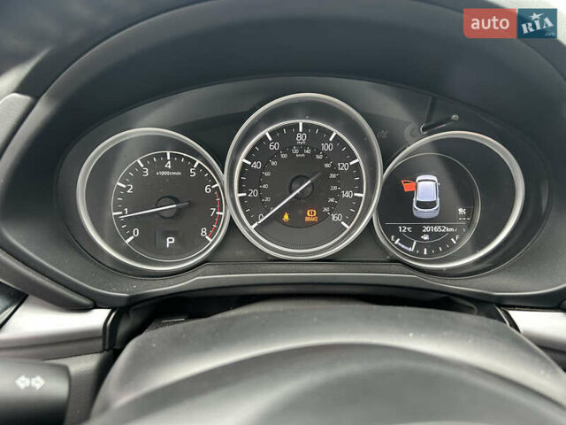 Синий Мазда СХ-5, объемом двигателя 2.49 л и пробегом 203 тыс. км за 16500 $, фото 7 на Automoto.ua