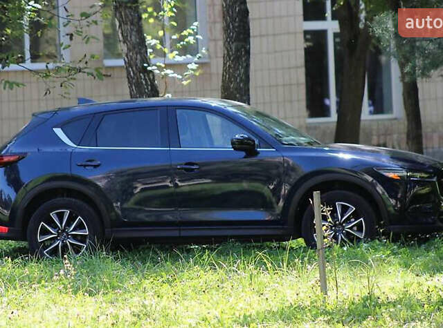 Синий Мазда СХ-5, объемом двигателя 2.49 л и пробегом 107 тыс. км за 17800 $, фото 6 на Automoto.ua