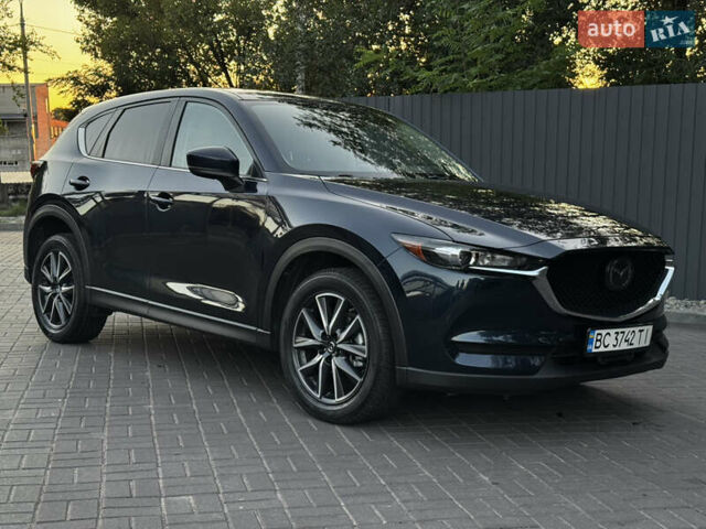 Синий Мазда СХ-5, объемом двигателя 2.49 л и пробегом 128 тыс. км за 18400 $, фото 6 на Automoto.ua