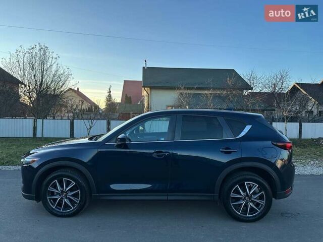 Синий Мазда СХ-5, объемом двигателя 2.5 л и пробегом 140 тыс. км за 18500 $, фото 2 на Automoto.ua