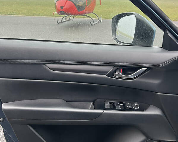 Синий Мазда СХ-5, объемом двигателя 2.49 л и пробегом 203 тыс. км за 16500 $, фото 14 на Automoto.ua