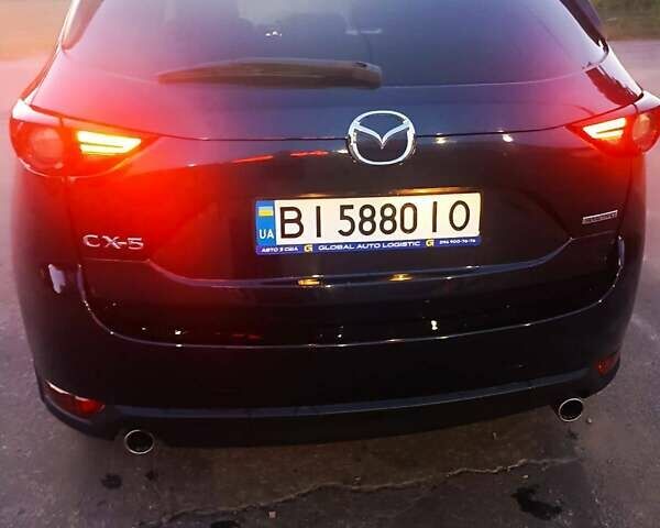 Синий Мазда СХ-5, объемом двигателя 2.5 л и пробегом 107 тыс. км за 21500 $, фото 1 на Automoto.ua