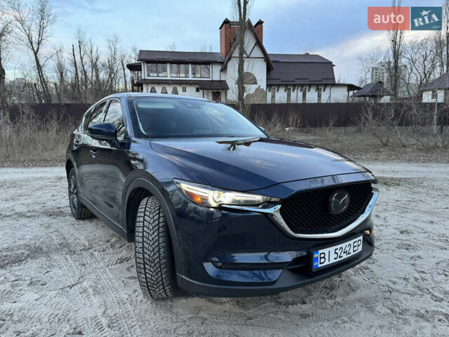 Синий Мазда СХ-5, объемом двигателя 2.49 л и пробегом 67 тыс. км за 22500 $, фото 1 на Automoto.ua