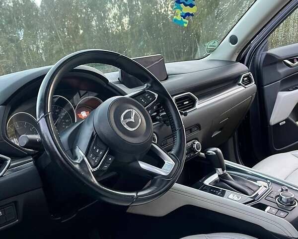 Синий Мазда СХ-5, объемом двигателя 2.49 л и пробегом 107 тыс. км за 18000 $, фото 27 на Automoto.ua