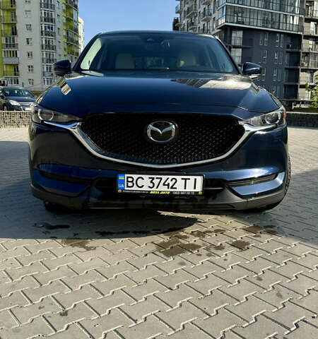 Синий Мазда СХ-5, объемом двигателя 2.49 л и пробегом 123 тыс. км за 16900 $, фото 3 на Automoto.ua