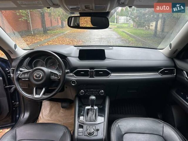 Синий Мазда СХ-5, объемом двигателя 2.49 л и пробегом 145 тыс. км за 18900 $, фото 33 на Automoto.ua