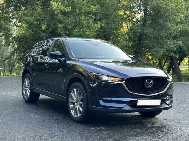 Синий Мазда СХ-5, объемом двигателя 2.5 л и пробегом 102 тыс. км за 11500 $, фото 1 на Automoto.ua