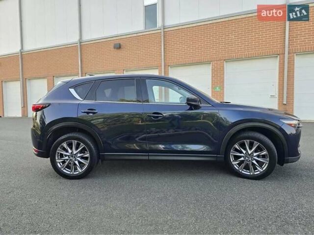 Синий Мазда СХ-5, объемом двигателя 2.49 л и пробегом 95 тыс. км за 24500 $, фото 6 на Automoto.ua