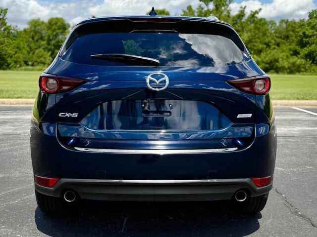 Синий Мазда СХ-5, объемом двигателя 2.5 л и пробегом 30 тыс. км за 4800 $, фото 5 на Automoto.ua