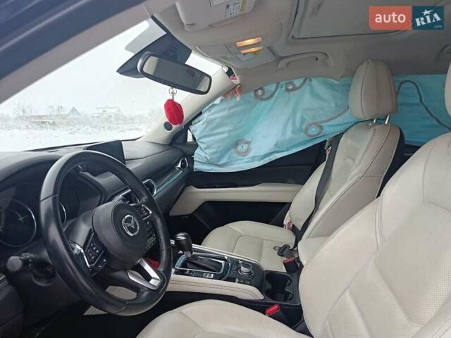 Синий Мазда СХ-5, объемом двигателя 2.5 л и пробегом 107 тыс. км за 11000 $, фото 4 на Automoto.ua