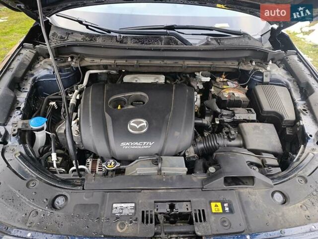 Синий Мазда СХ-5, объемом двигателя 2.5 л и пробегом 107 тыс. км за 11000 $, фото 6 на Automoto.ua